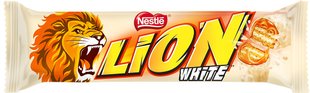 Вафли Lion White с мягкой карамелью покрытые хлопьями и белой глазурью 42 г (7613034120151) 000079736 фото