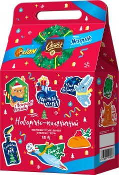 Новорічний подарунковий набір цукерок Nestle Lion Nesquik Світоч Новорічні стікери 621 г (8445290518958) 000074679 фото