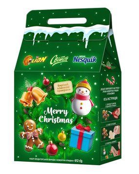 Новорічний подарунок цукерок Lion Світоч Nesquik Новорічні іграшки 612 г. (8445291469891) 000090026 фото